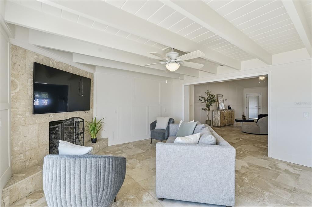 15302 Harbor Drive Madeira Beach, FL 33708 - Photo 20 of 47 a living room with furniture and a flat screen tv