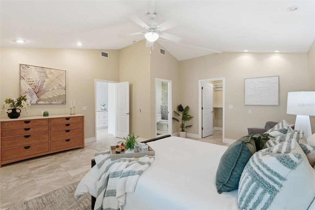 15302 Harbor Drive Madeira Beach, FL 33708 - Photo 21 of 47 a bed room with a bed and a dresser