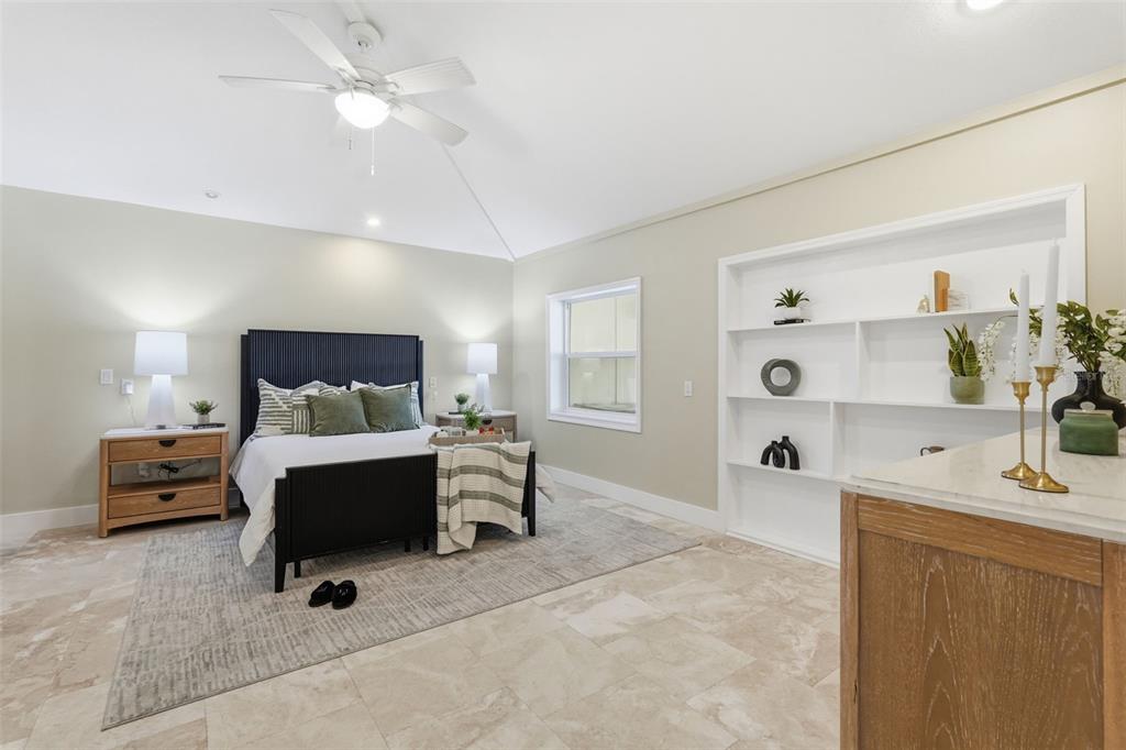 15302 Harbor Drive Madeira Beach, FL 33708 - Photo 22 of 47 a bedroom with furniture and window
