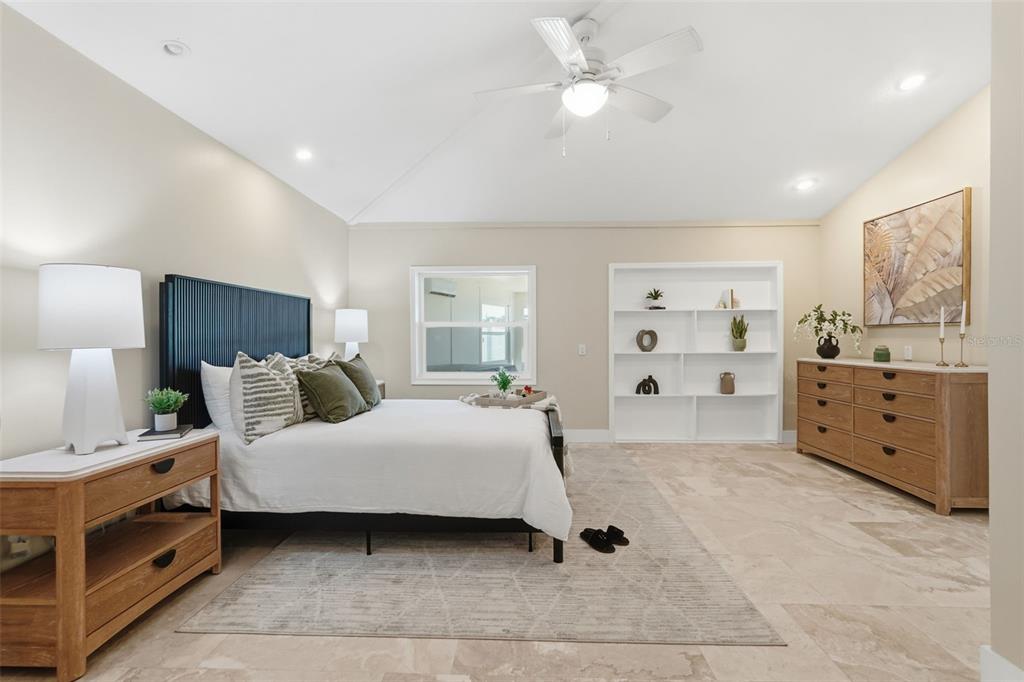 15302 Harbor Drive Madeira Beach, FL 33708 - Photo 23 of 47 a bedroom with a bed and a cabinets