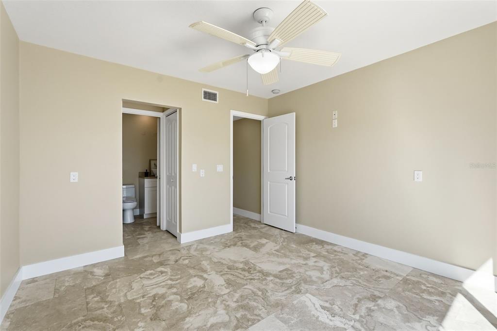 15302 Harbor Drive Madeira Beach, FL 33708 - Photo 27 of 47 wooden floor in an empty room