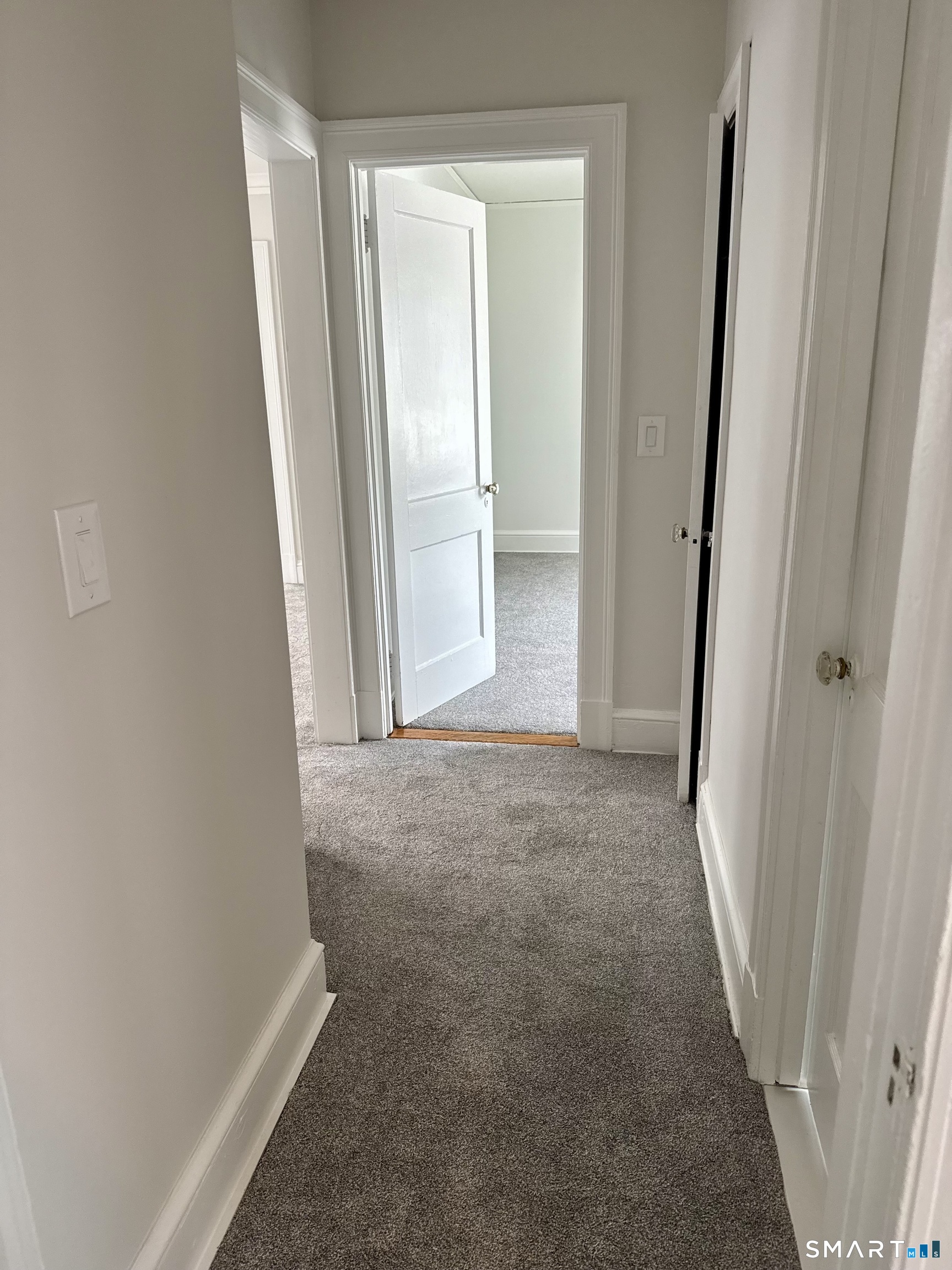 144 Wolcott Hill Road Wethersfield, CT 06109 - Photo 14 of 17 hallway to bedrooms and bath