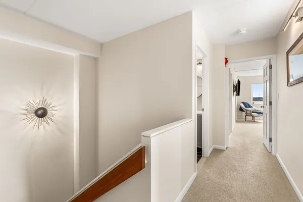 a view of a livingroom with wooden floor