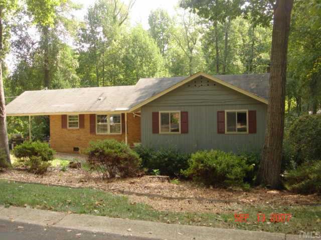 1906 Medfield Road Raleigh, NC 27607 - Photo 1 of 12 a front view of a house with a yard