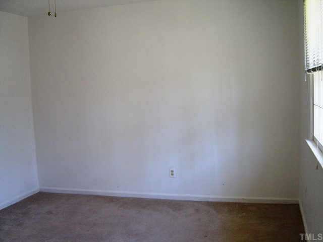 1906 Medfield Road Raleigh, NC 27607 - Photo 8 of 12 a room that has a window in it
