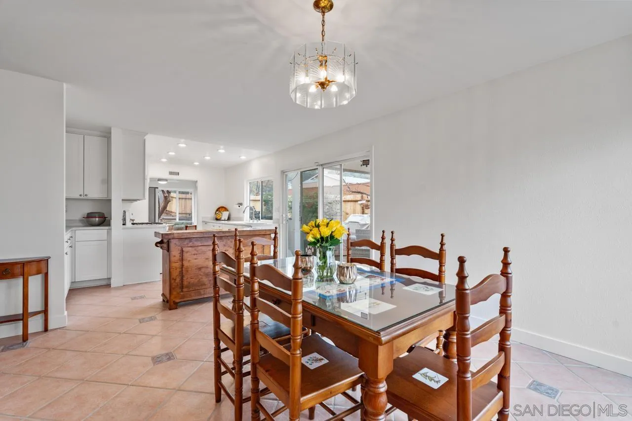 801 Ladysmith Drive El Cajon, CA 92020 - Photo 11 of 38 a view of a dining room with furniture and chandelier