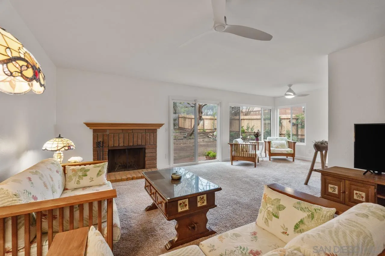 801 Ladysmith Drive El Cajon, CA 92020 - Photo 15 of 38 a living room with furniture fireplace and flat screen tv
