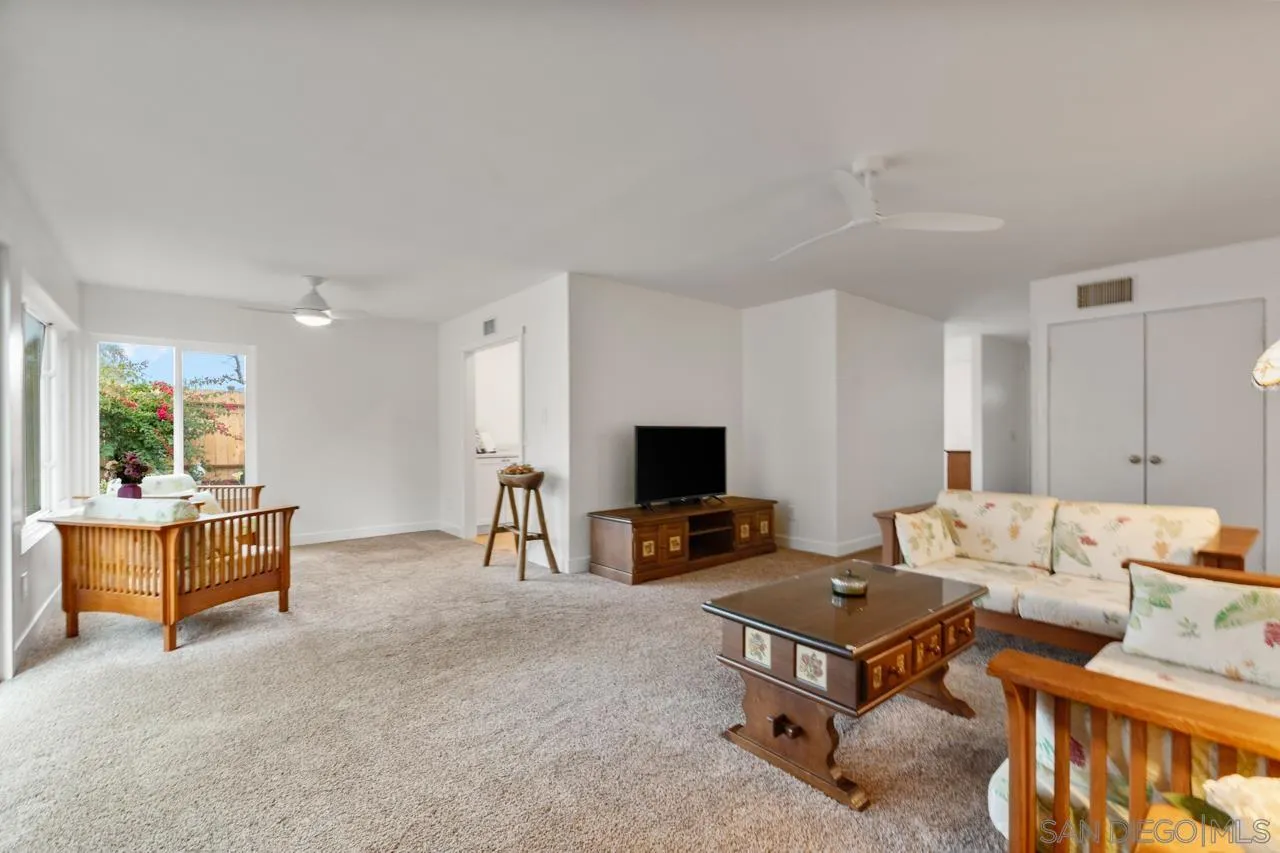 801 Ladysmith Drive El Cajon, CA 92020 - Photo 17 of 38 a living room with furniture and a flat screen tv