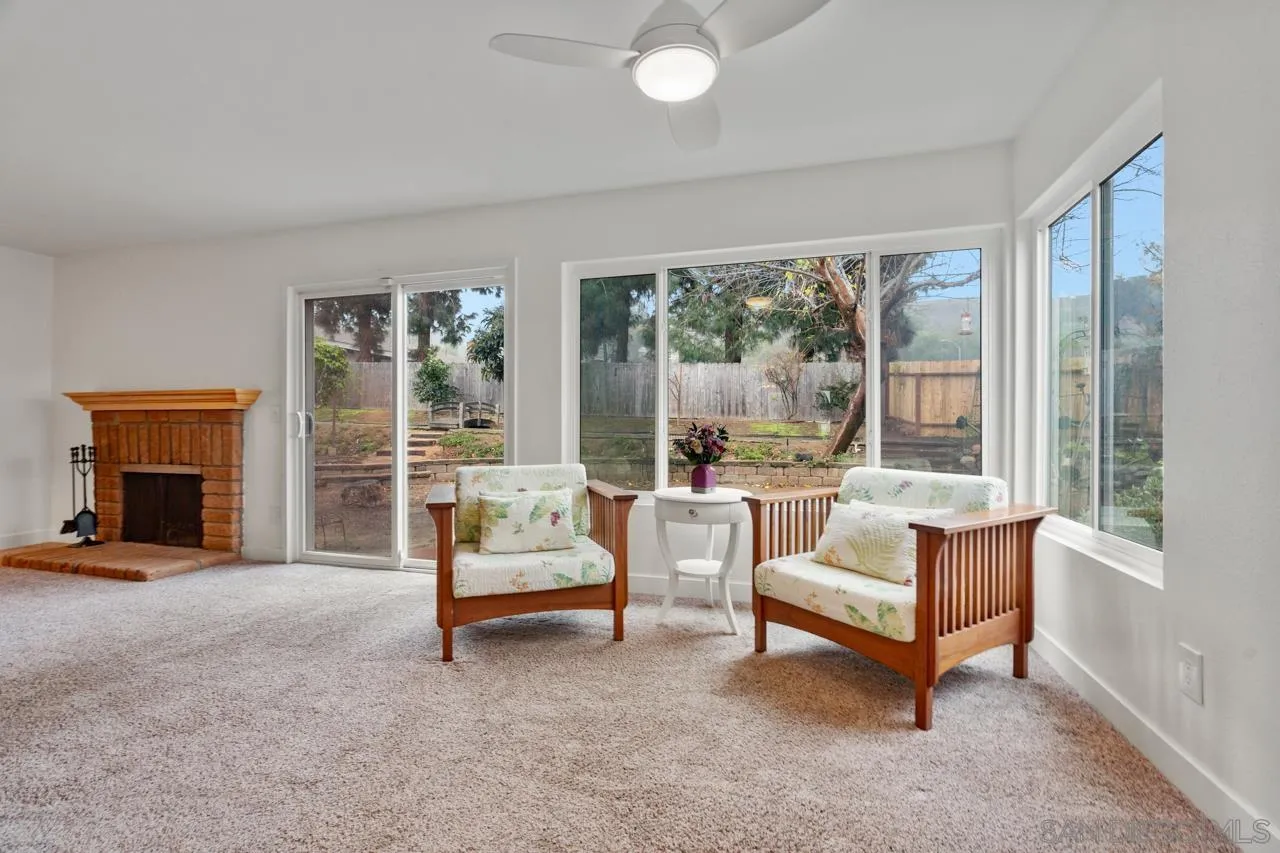 801 Ladysmith Drive El Cajon, CA 92020 - Photo 20 of 38 a living room with furniture and a fireplace
