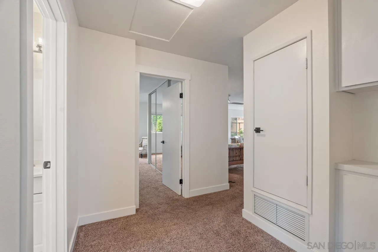 801 Ladysmith Drive El Cajon, CA 92020 - Photo 21 of 38 an empty room that has a wooden cupboard
