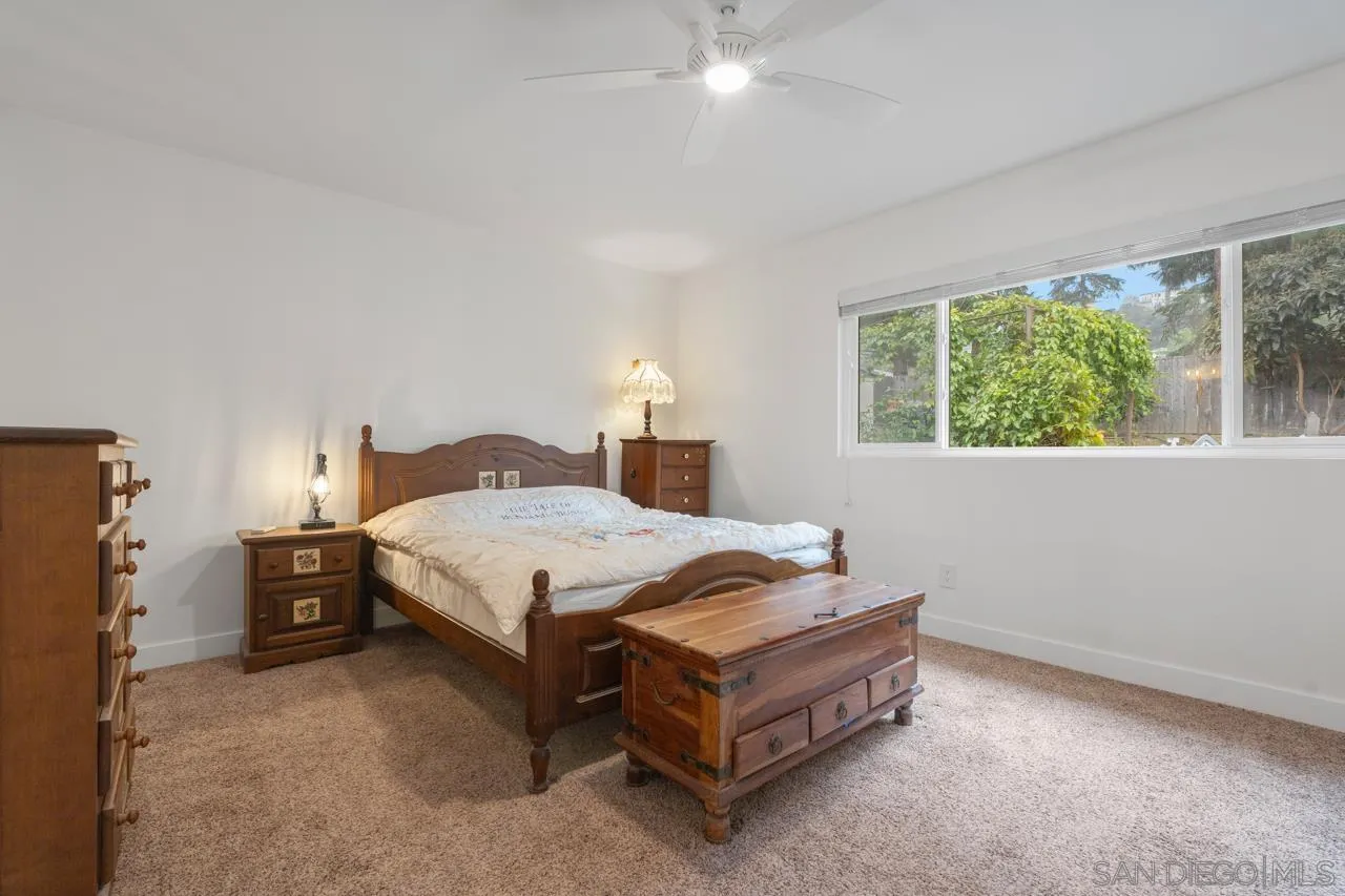 801 Ladysmith Drive El Cajon, CA 92020 - Photo 22 of 38 a bed sitting in a bedroom next to a window