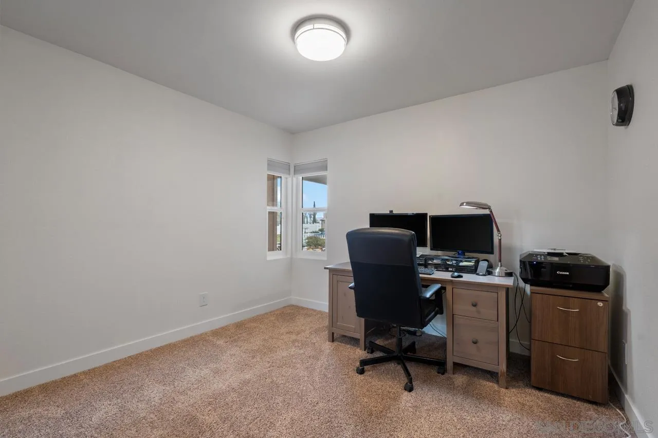 801 Ladysmith Drive El Cajon, CA 92020 - Photo 25 of 38 a view of a workspace with furniture and a window