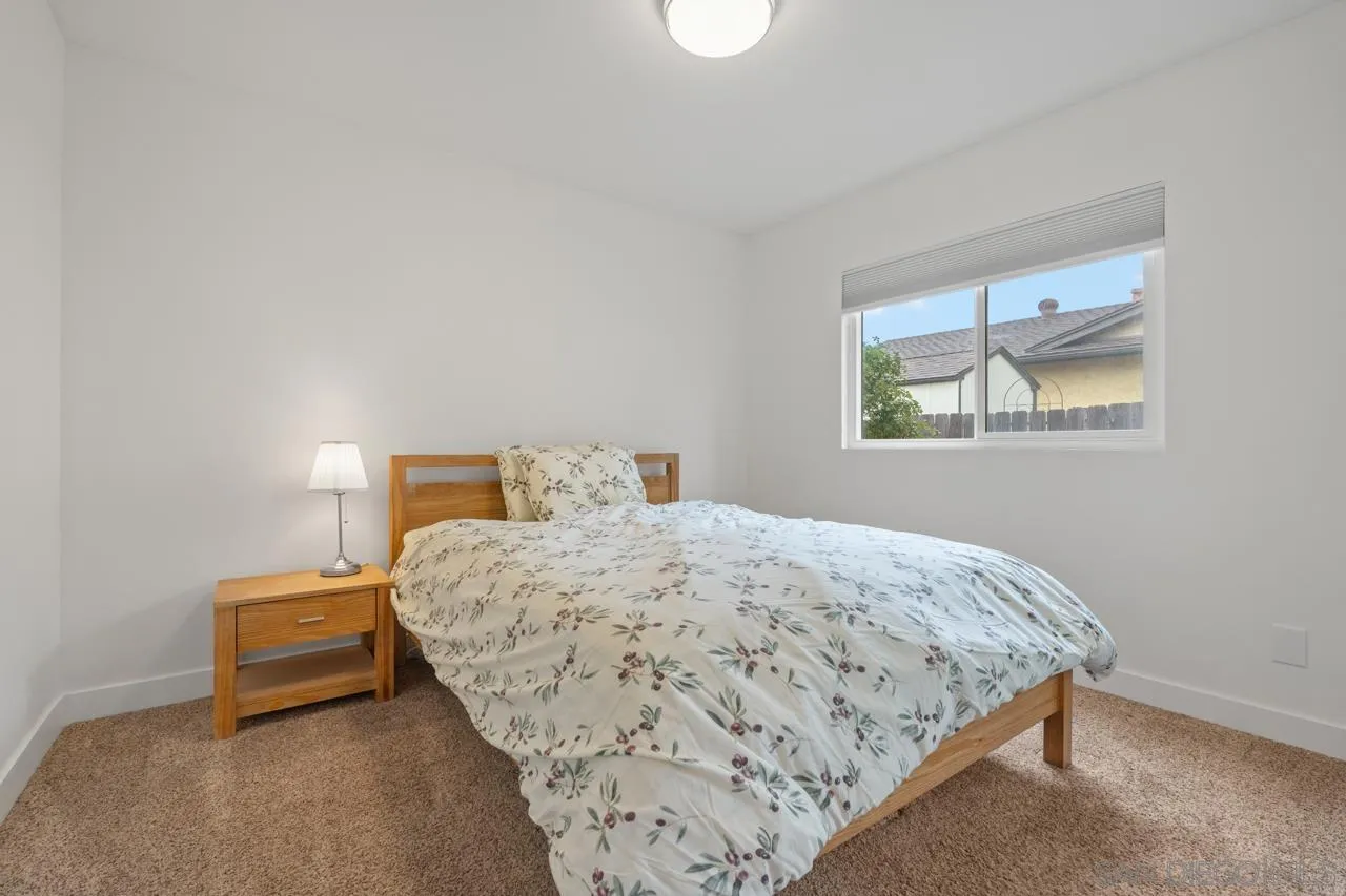 801 Ladysmith Drive El Cajon, CA 92020 - Photo 29 of 38 a bedroom with a bed and a window