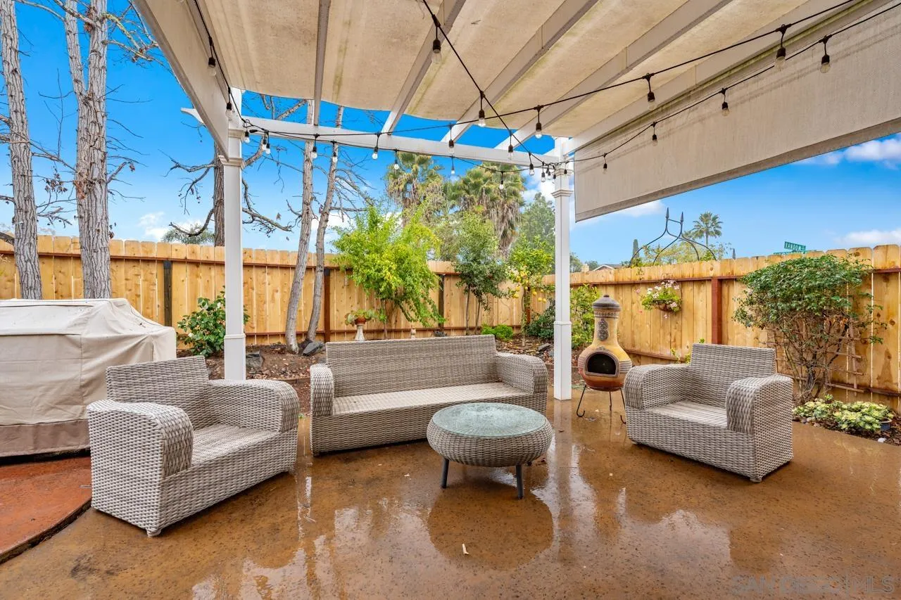 801 Ladysmith Drive El Cajon, CA 92020 - Photo 31 of 38 a living room with furniture and a chandelier