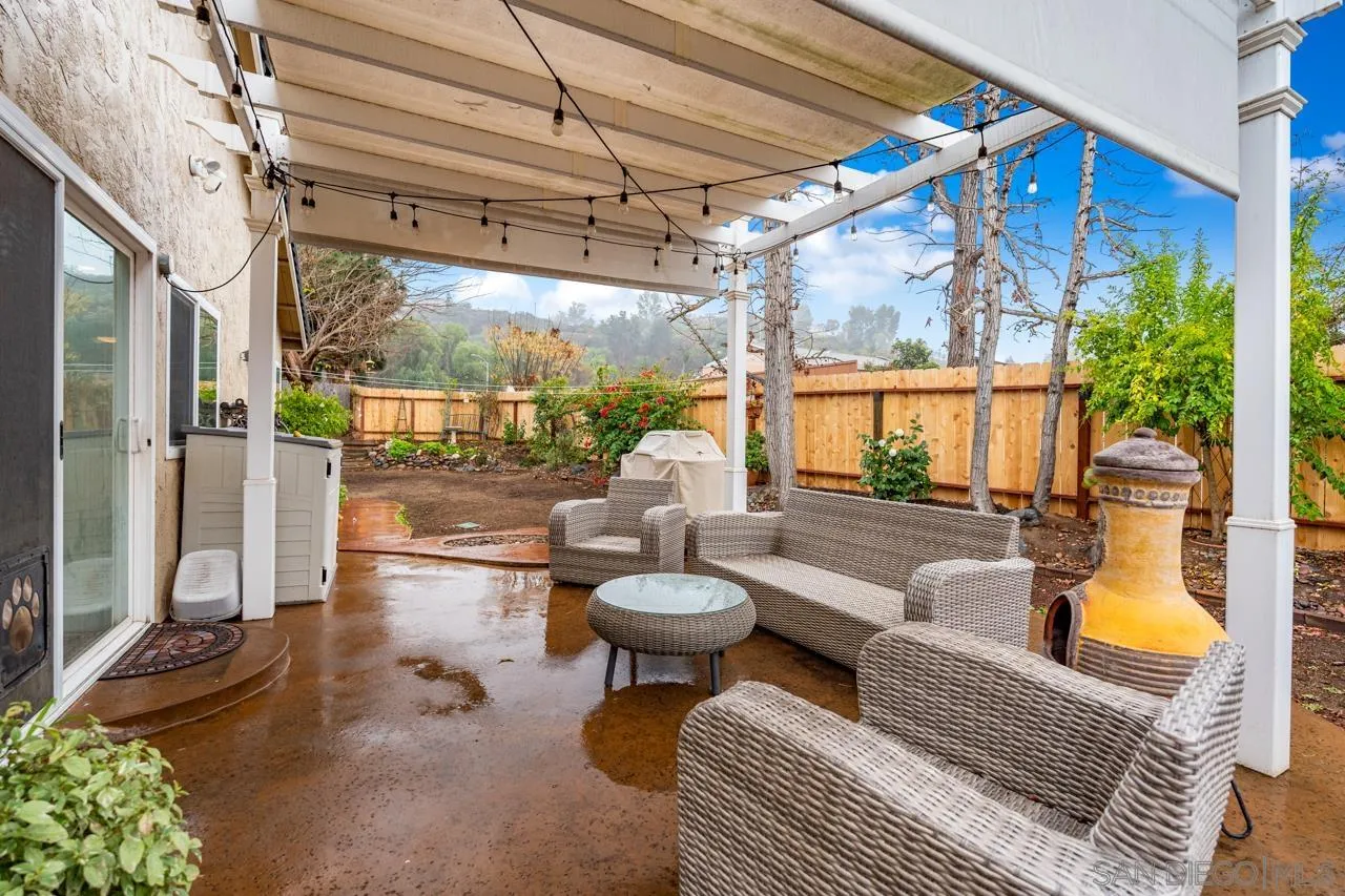 801 Ladysmith Drive El Cajon, CA 92020 - Photo 32 of 38 a living room with patio furniture and a potted plant