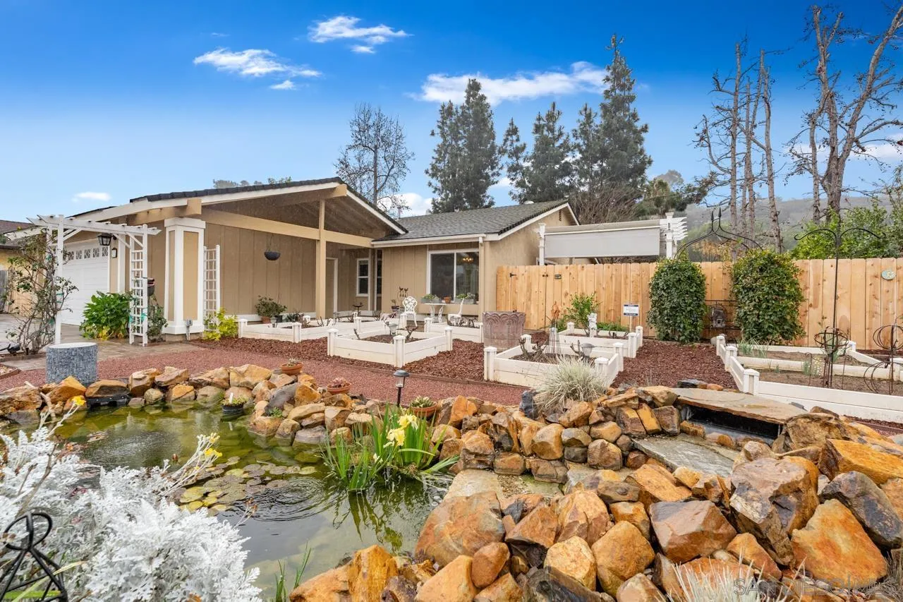 801 Ladysmith Drive El Cajon, CA 92020 - Photo 5 of 38 a view of a house with swimming pool and sitting area