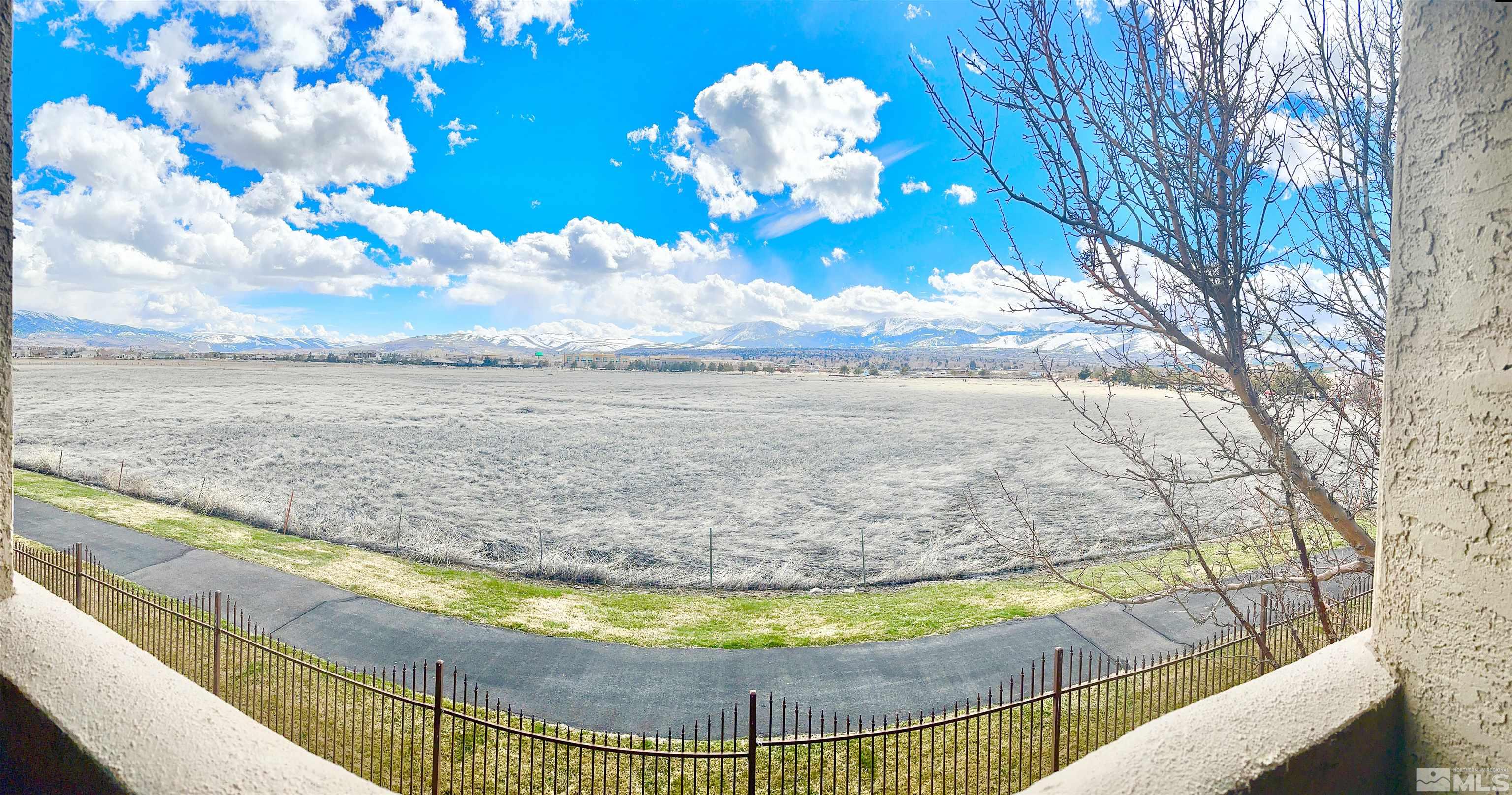 a view of a wooden floor with a faucet
