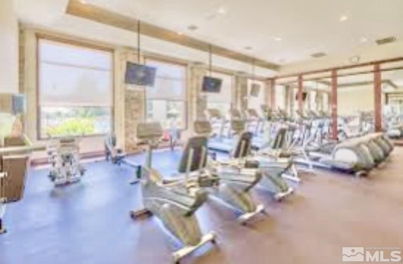 900 S Meadows, Unit 5122 Reno, NV 89521 - Photo 11 of 38 a living room with lots of furniture and a large window