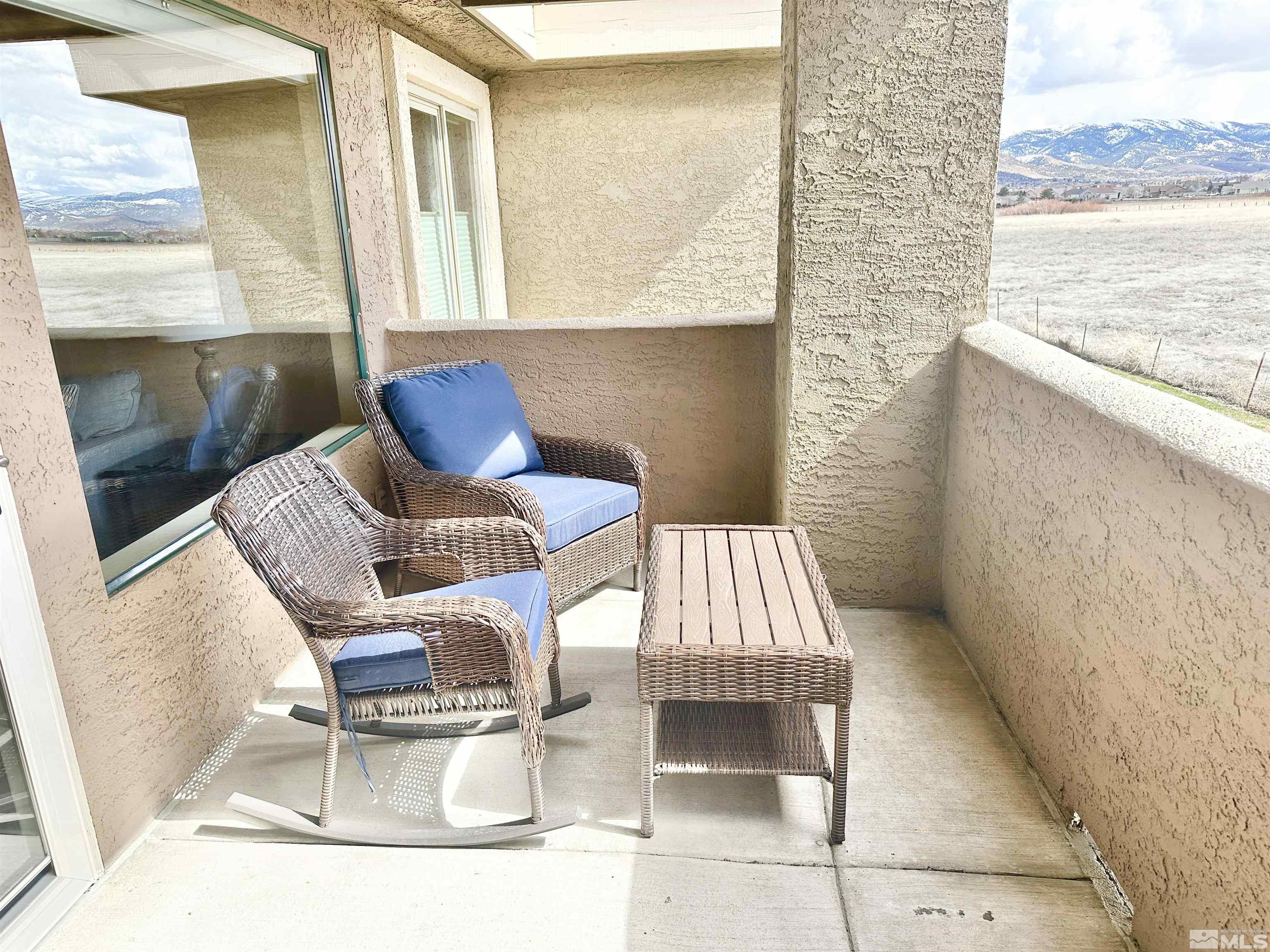 900 S Meadows, Unit 5122 Reno, NV 89521 - Photo 18 of 38 a view of balcony with couch