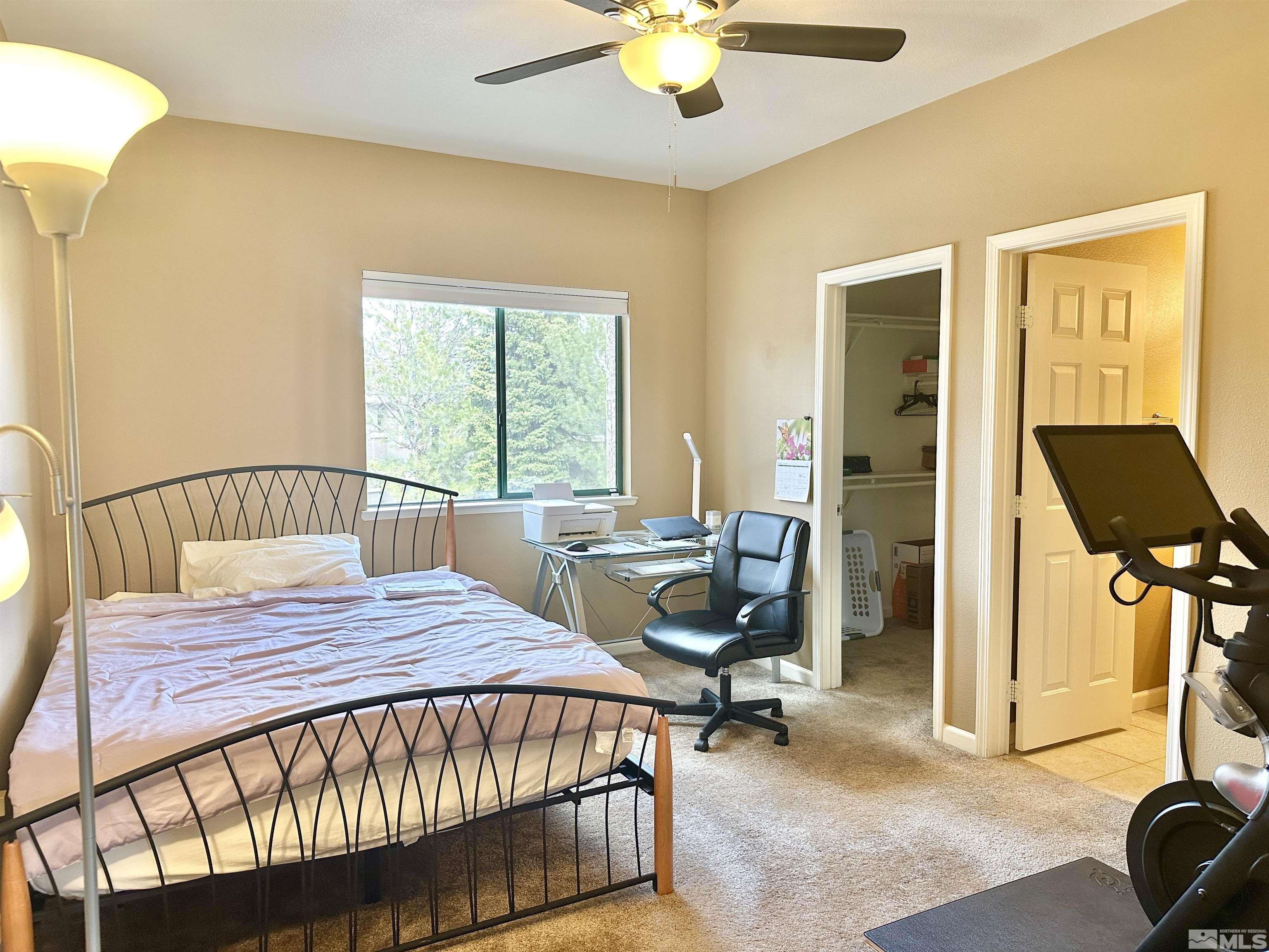900 S Meadows, Unit 5122 Reno, NV 89521 - Photo 30 of 38 a view of a livingroom with furniture and a window