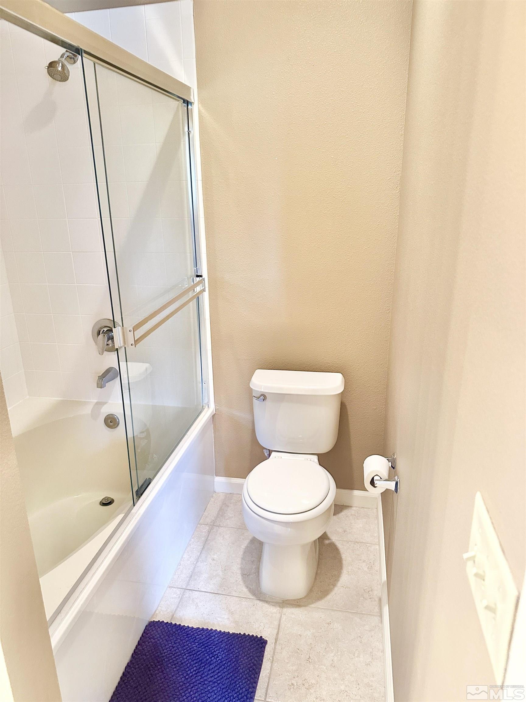 900 S Meadows, Unit 5122 Reno, NV 89521 - Photo 32 of 38 a bathroom with a toilet and a shower