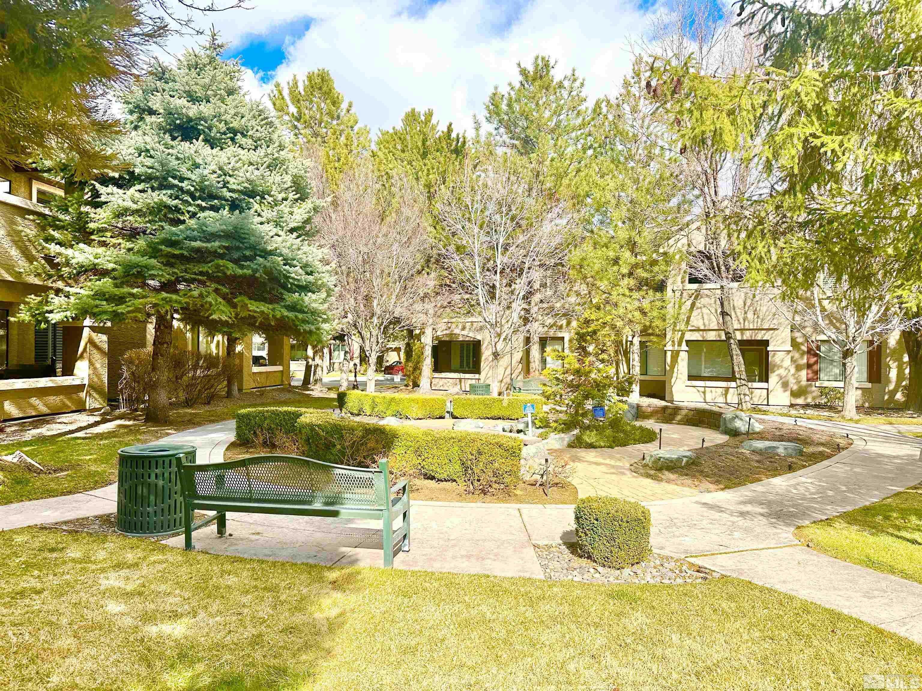 900 S Meadows, Unit 5122 Reno, NV 89521 - Photo 36 of 38 a swimming pool with outdoor seating and yard