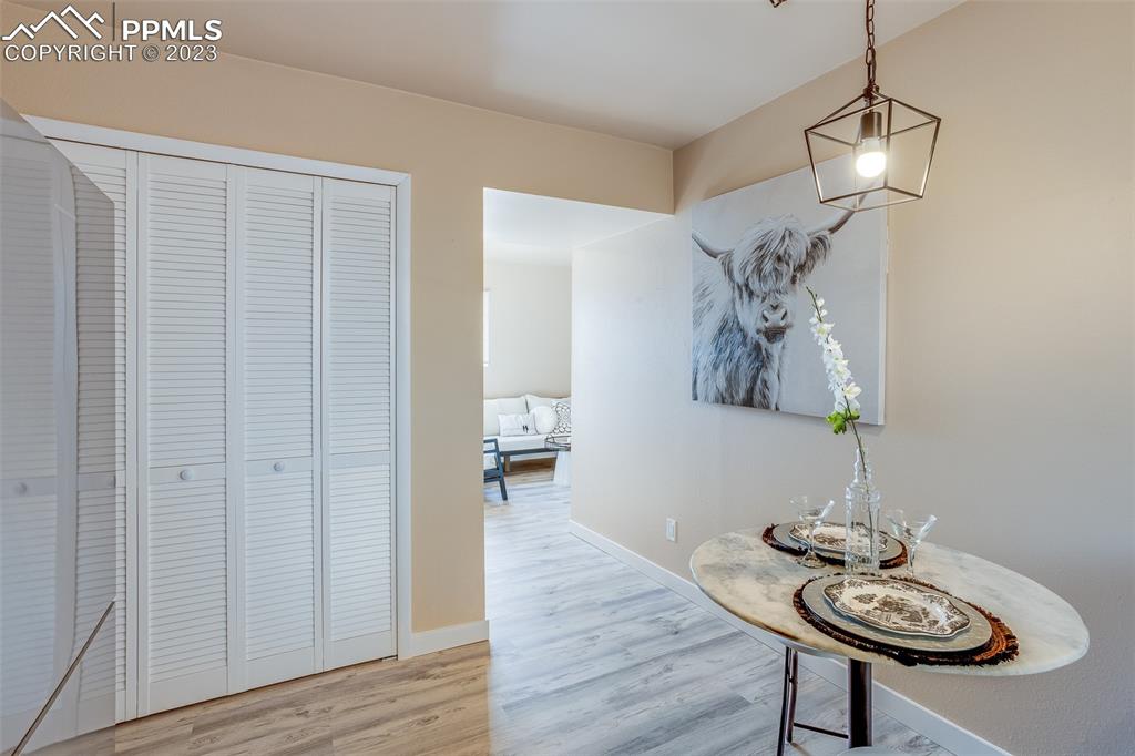 2139 Preuss Road, Unit C Colorado Springs, CO 80910 - Photo 5 of 14 a room with furniture and wooden floor