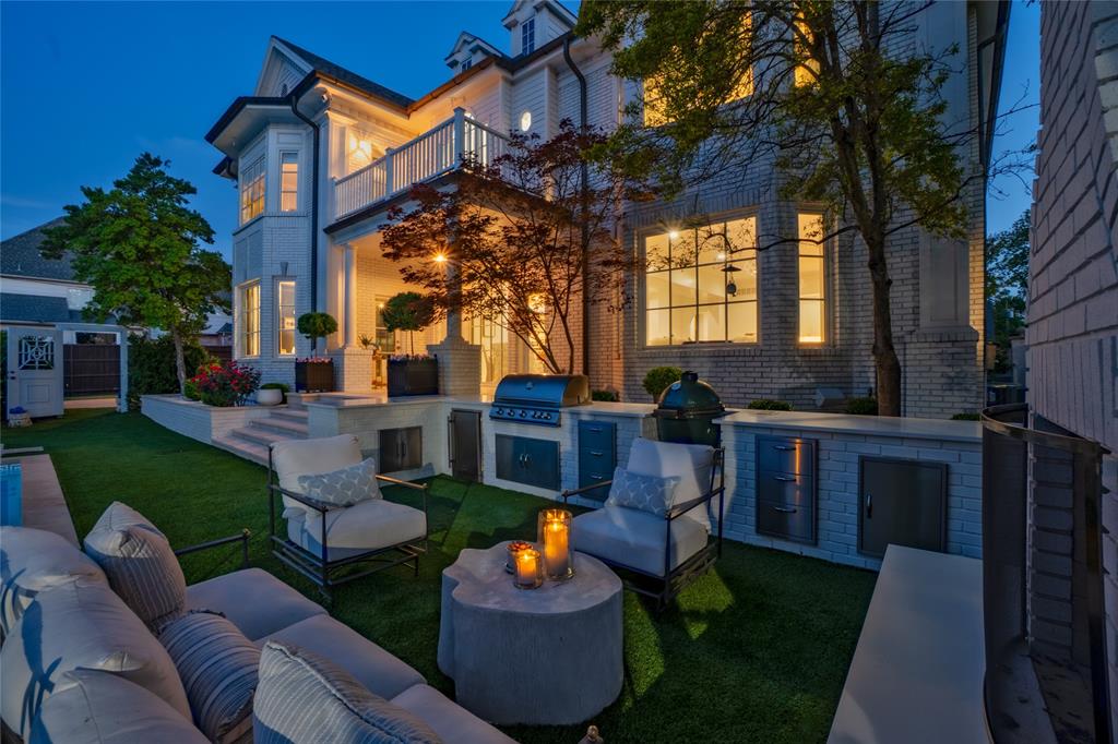 6331 Waggoner Drive Dallas, TX 75230 - Photo 33 of 36 a backyard of a house with outdoor seating