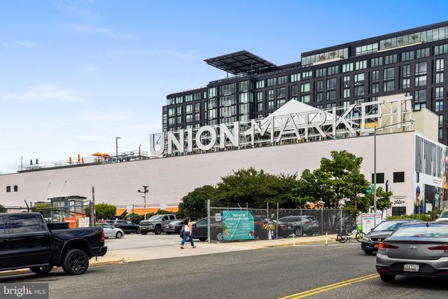 a view of a street and cars