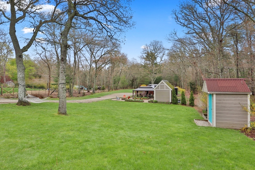 2045 Main Street Barnstable, MA 02648 - Photo 23 of 41 a view of a house with a park