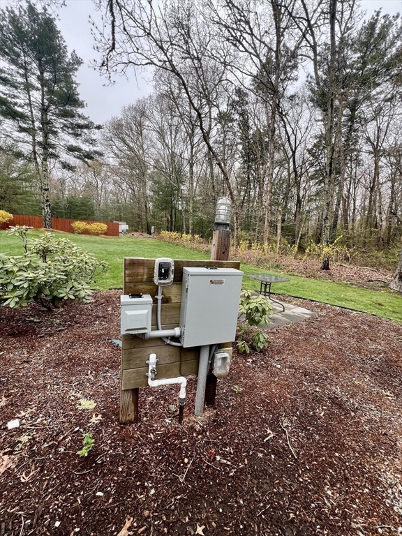 2045 Main Street Barnstable, MA 02648 - Photo 35 of 41 a view of a yard with a table and chairs