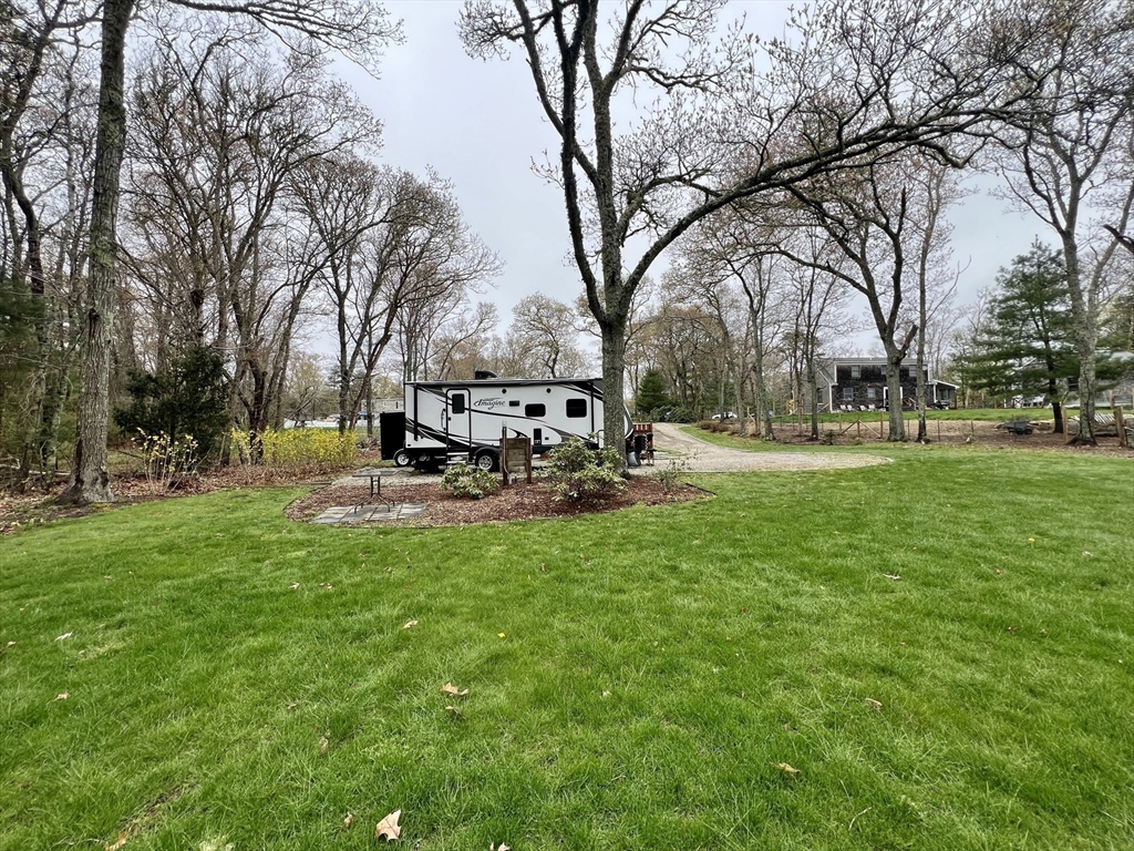 2045 Main Street Barnstable, MA 02648 - Photo 39 of 41 a view of a park with bench and trees