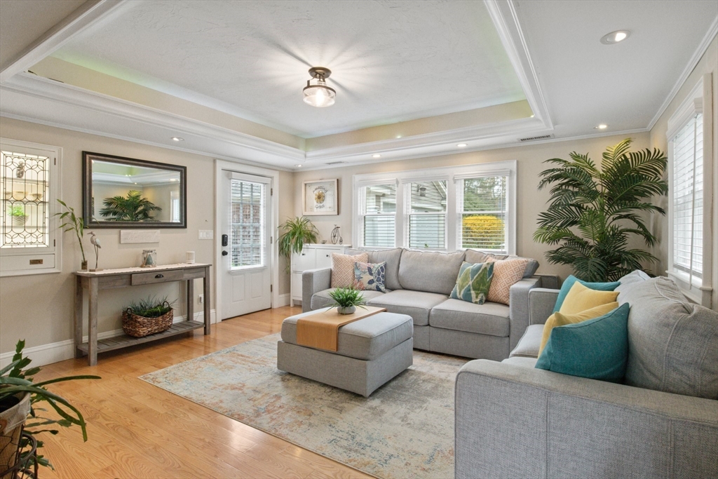 2045 Main Street Barnstable, MA 02648 - Photo 6 of 41 a living room with furniture and a fireplace