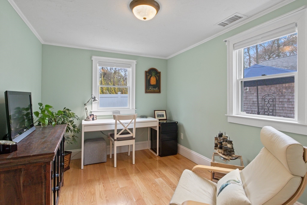 2045 Main Street Barnstable, MA 02648 - Photo 9 of 41 a view of a workspace with furniture and a window