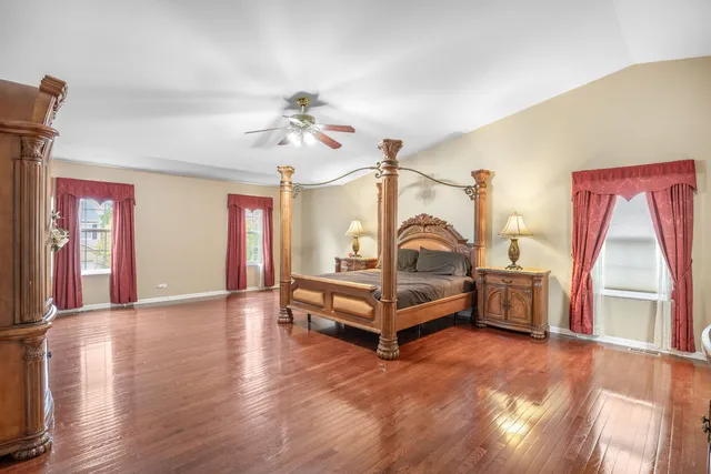 a bedroom with furniture and a window