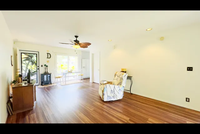 a view of a living room and dining room