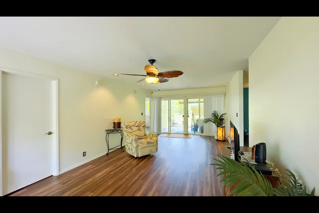 a view of a living room and dining room