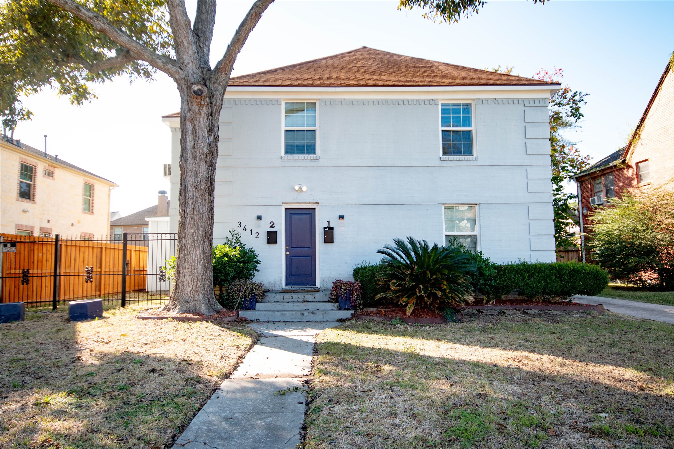 3412 Rosedale Street Houston, TX 77004 - Photo 1 of 26 a front view of a house with a yard