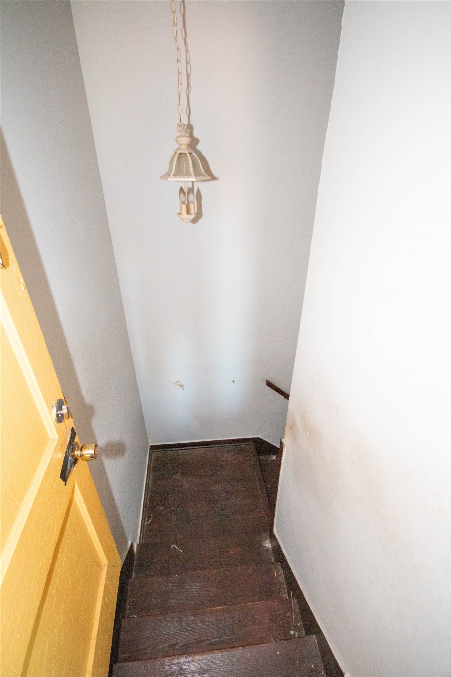3412 Rosedale Street Houston, TX 77004 - Photo 21 of 26 a view of a hallway with wooden floor and staircase