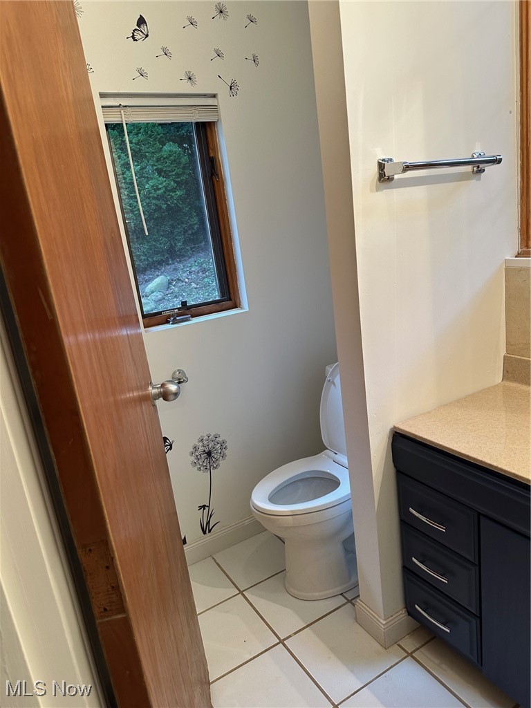 1224 Ridge Road Salem, OH 44460 - Photo 44 of 48 Bathroom with vanity and tile patterned floors