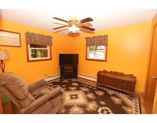 18 Rita Street Lowell, MA 01854 - Photo 9 of 14 a living room with furniture and a window
