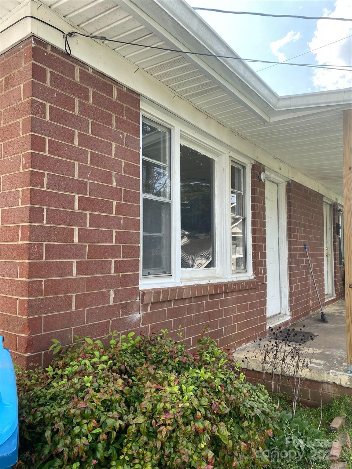 1345 Standish Street, Unit A Salisbury, NC 28144 - Photo 2 of 16 a view of a brick house with a large window