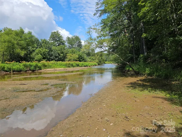 a view of a road with a yard