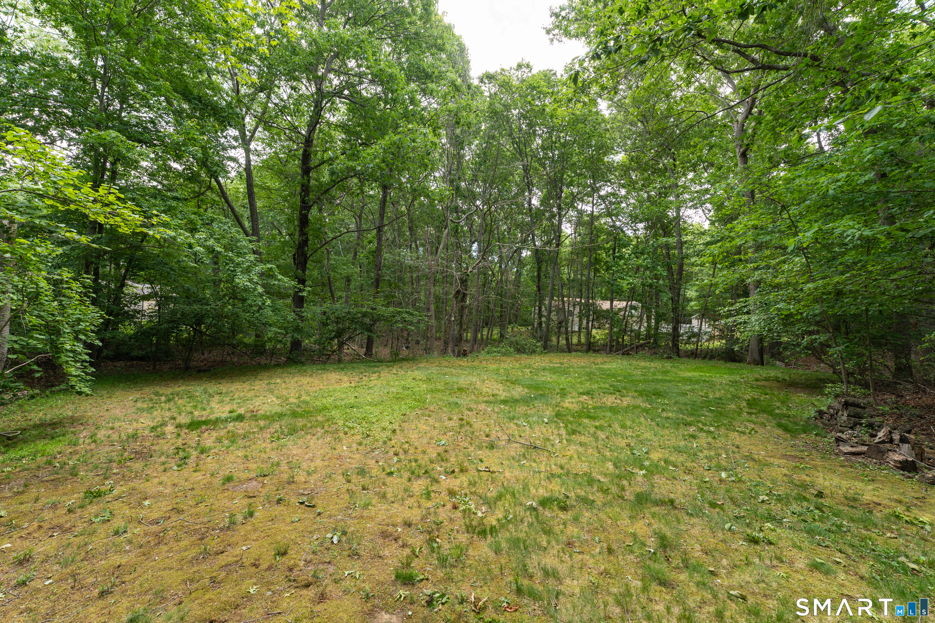 46 Laurel Cliffs Road Guilford, CT 06437 - Photo 35 of 40 The "extra yard" is to the east of the house and pool. It has been an excellent open space for swing sets, soccer playing, and flash-light tag.