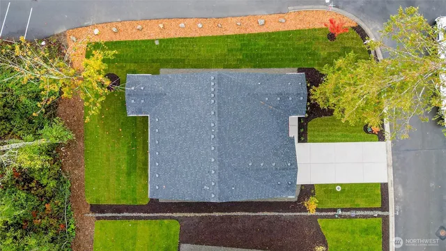 a view of house with a swimming pool