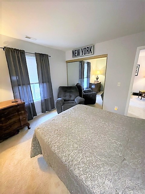 308 Richfield Trail Romeoville, IL 60446 - Photo 12 of 18 a bed room with a bed and a television
