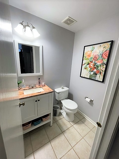 308 Richfield Trail Romeoville, IL 60446 - Photo 15 of 18 a bathroom with a toilet sink and mirror