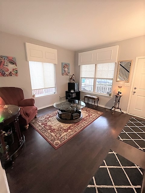 308 Richfield Trail Romeoville, IL 60446 - Photo 4 of 18 a living room with furniture hard wood floor and a window