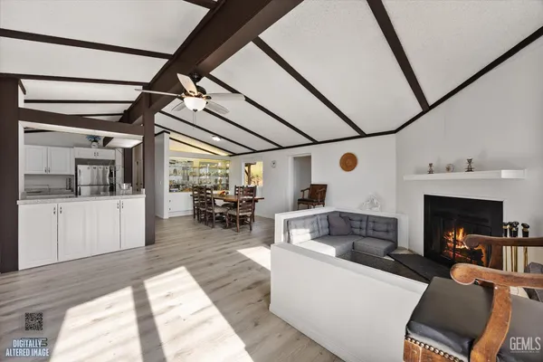 a kitchen with stainless steel appliances granite countertop a stove and a refrigerator