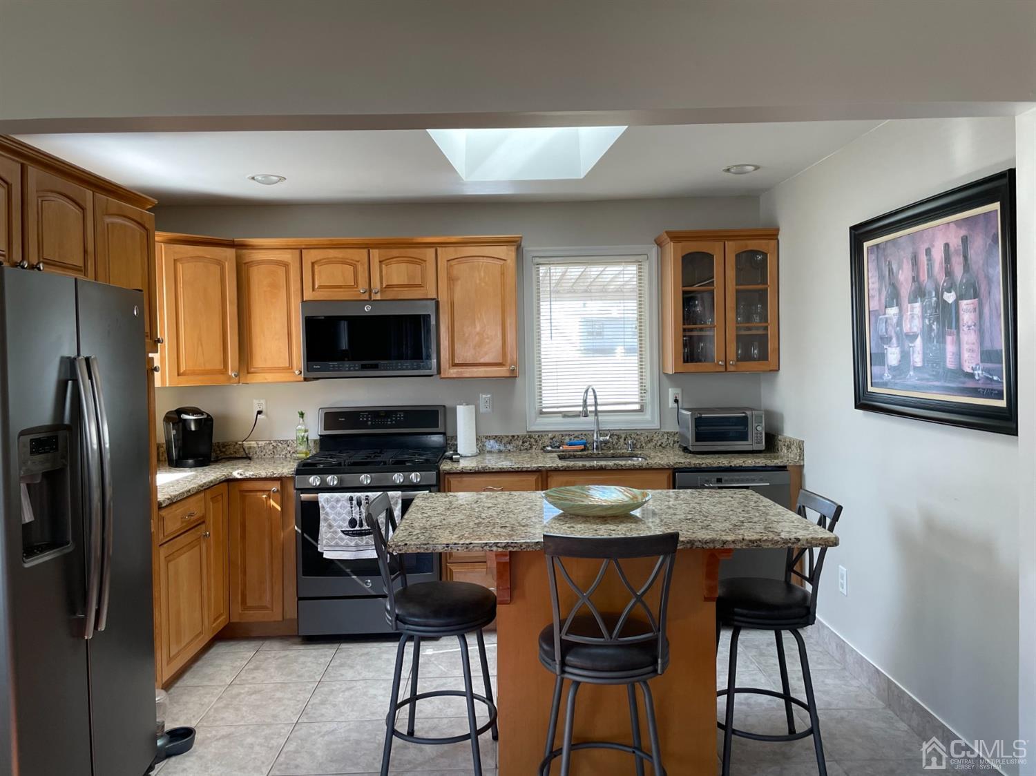 43 Brookville Road Edison, NJ 08817 - Photo 1 of 31 a kitchen with stainless steel appliances granite countertop a stove refrigerator sink and microwave